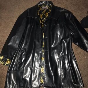 100% leather coat. Reversible, insides.